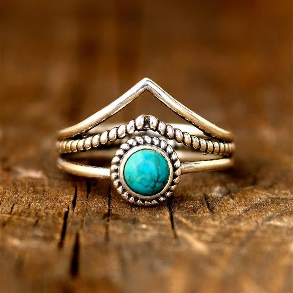 Anillo con cuentas turquesa · Dorado