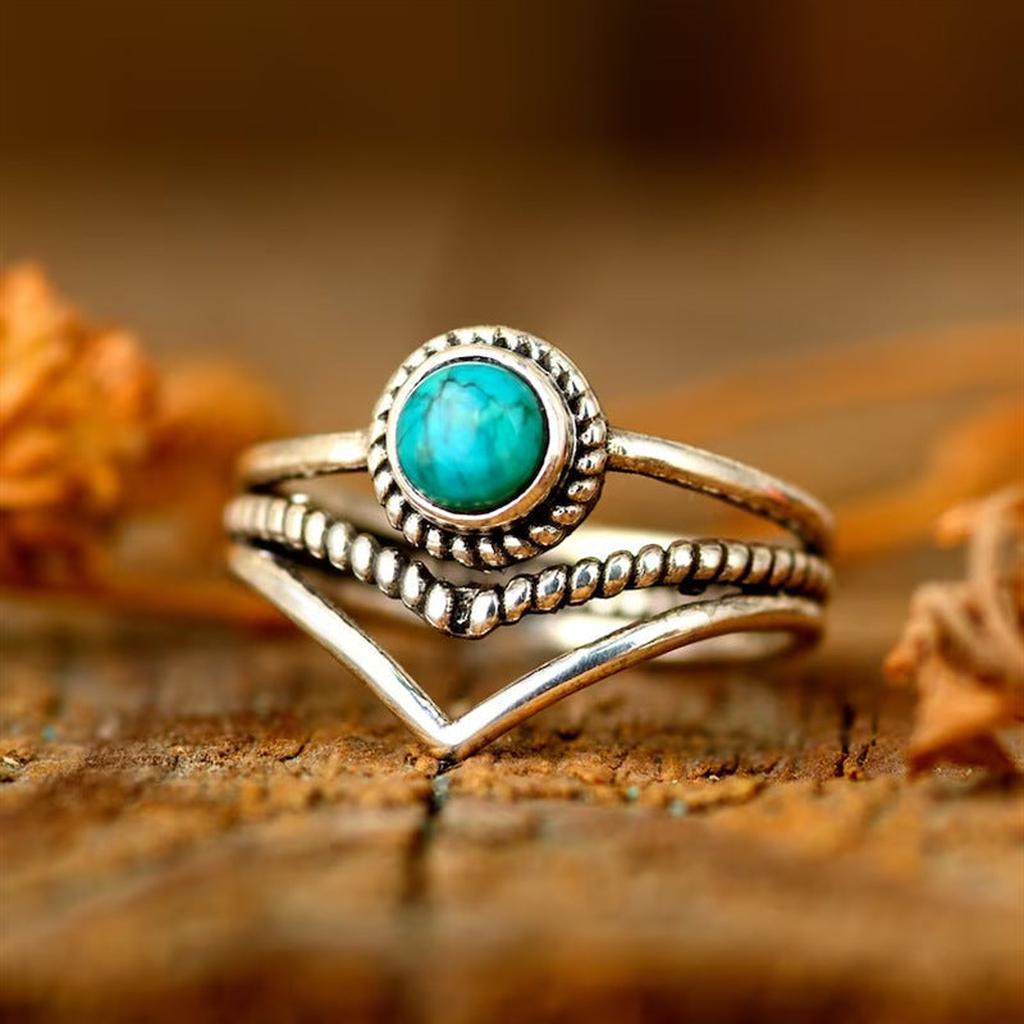 Anillo con cuentas turquesa · Dorado