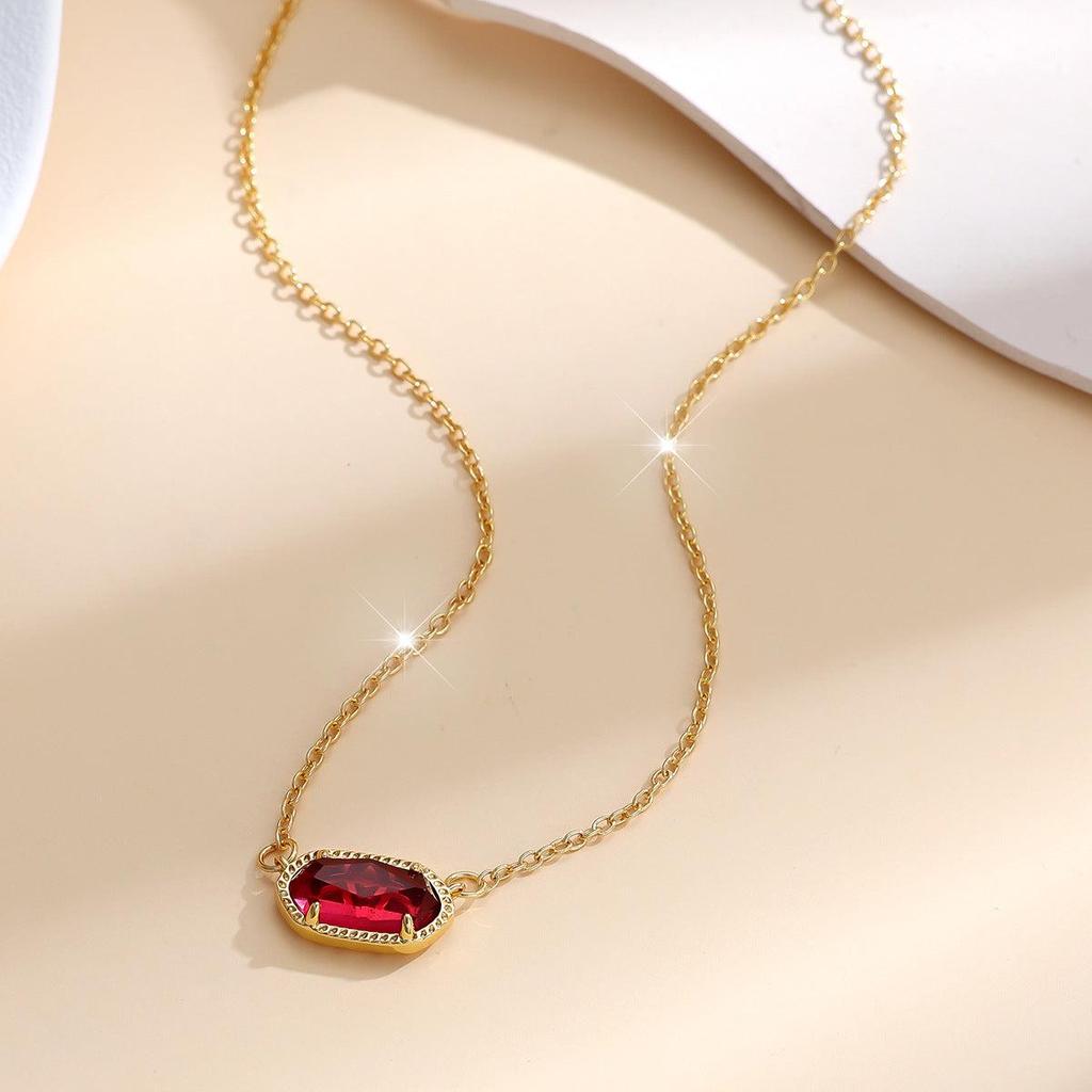 Collar ovalado clásico rojo rubí · Dorado