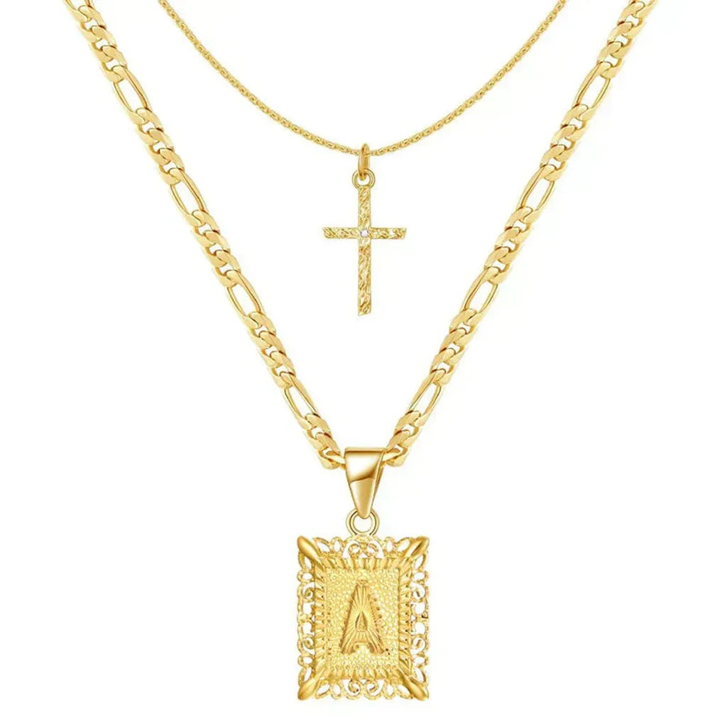 Collar doble con cruz e inicial · Dorado