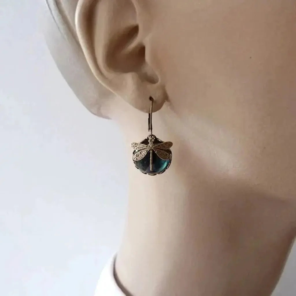 Pendientes libélula con esfera de color · Dorado