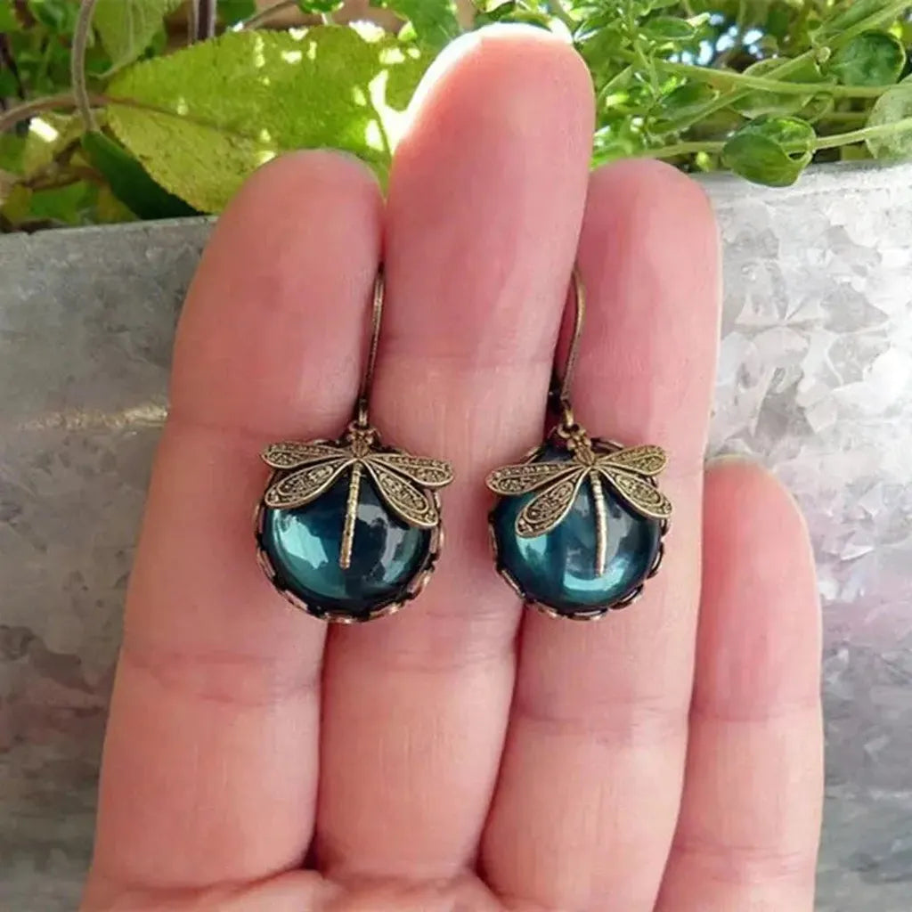 Pendientes libélula con esfera de color · Dorado