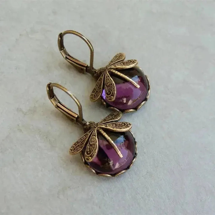 Pendientes libélula con esfera de color · Dorado