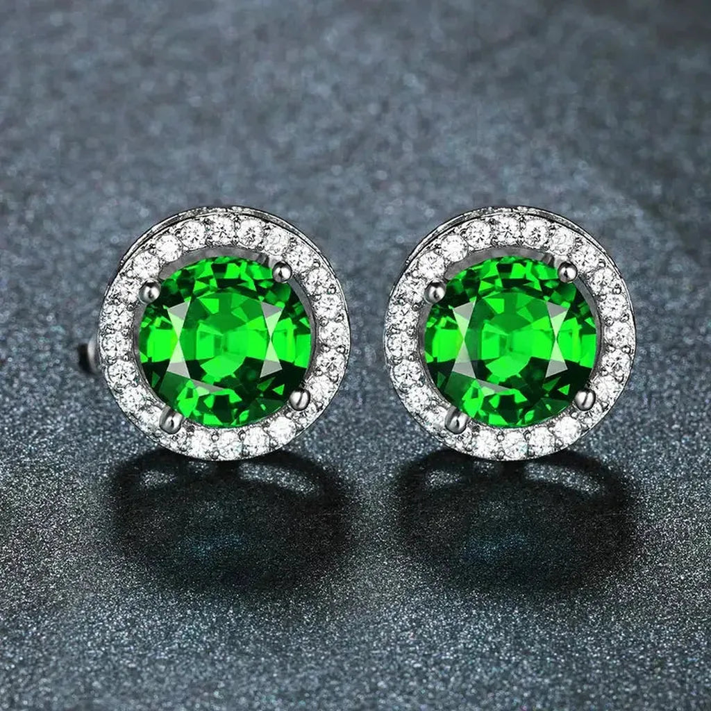 Pendientes de botón verde esmeralda con halo · Plateado