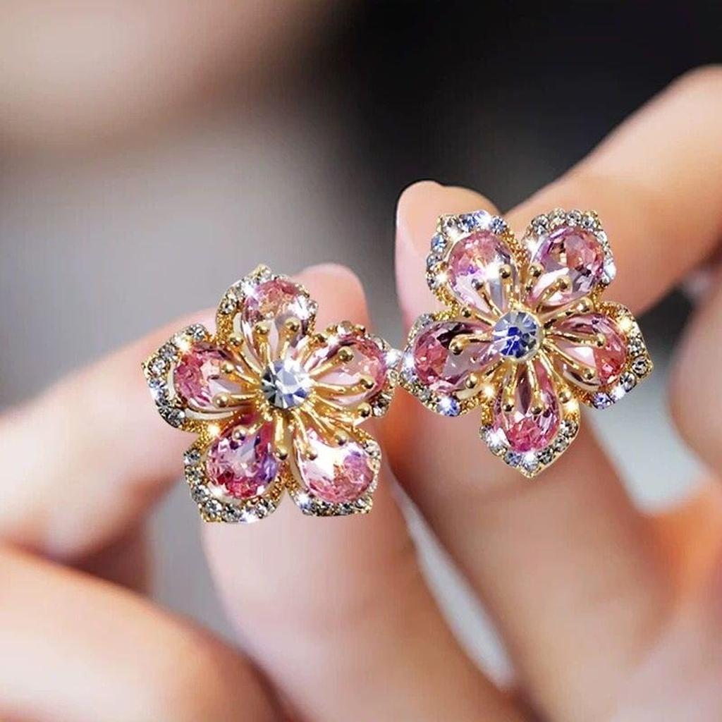 Pendientes de flor con brillos rosas · Dorado