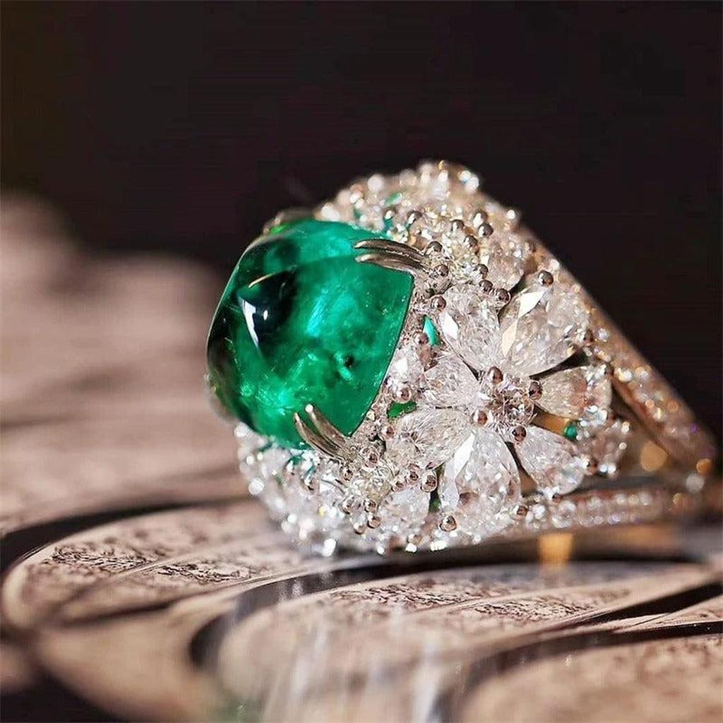 Anillo flor retro con piedra verde y brillos