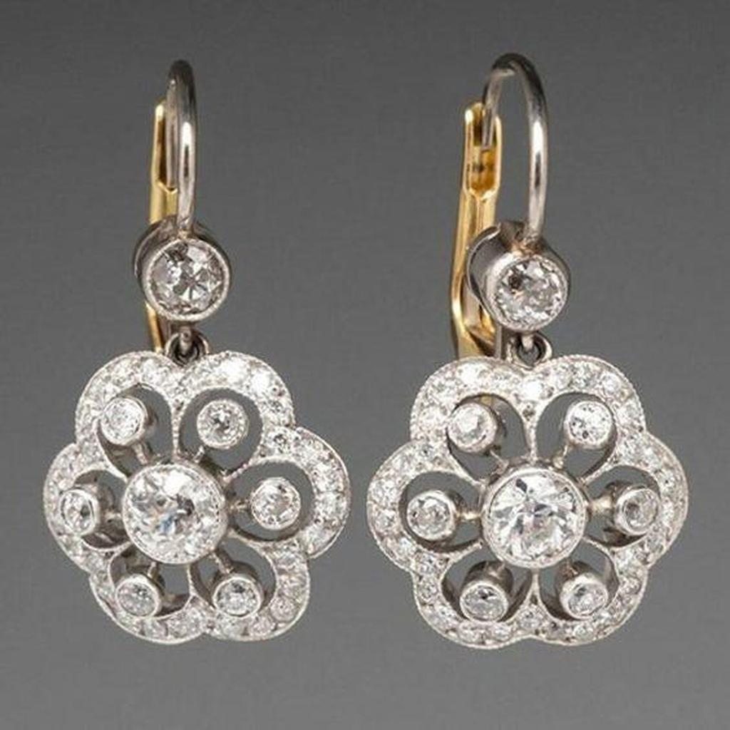 Pendientes retro de flor con brillos · Plateado