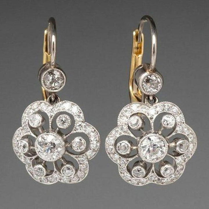 Pendientes retro de flor con brillos · Plateado