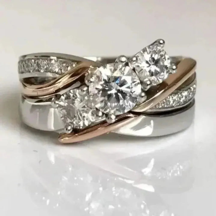 Anillo retro de tres brillos · Bicolor
