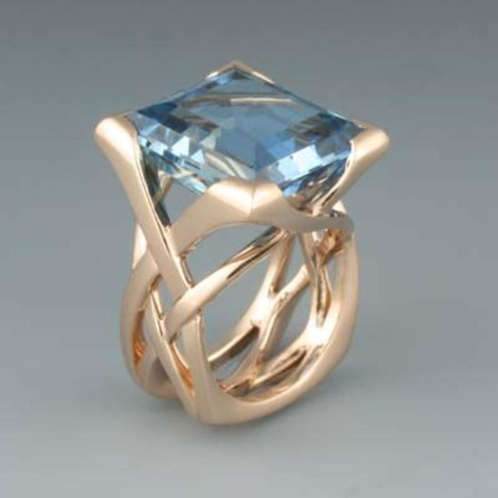 Anillo retro cuadrado azul con banda trenzada · Rosado