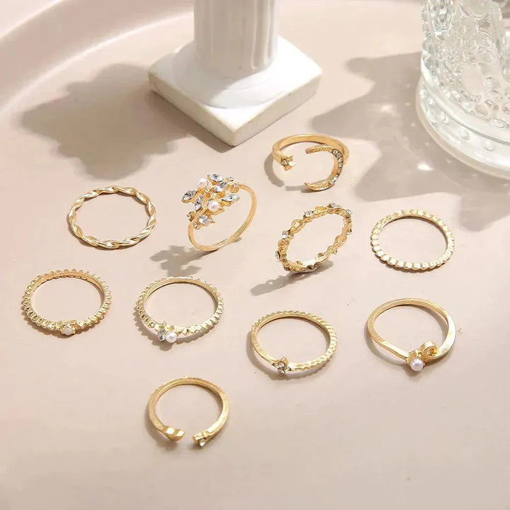 Set de 10 anillos luna y estrellas · Dorado