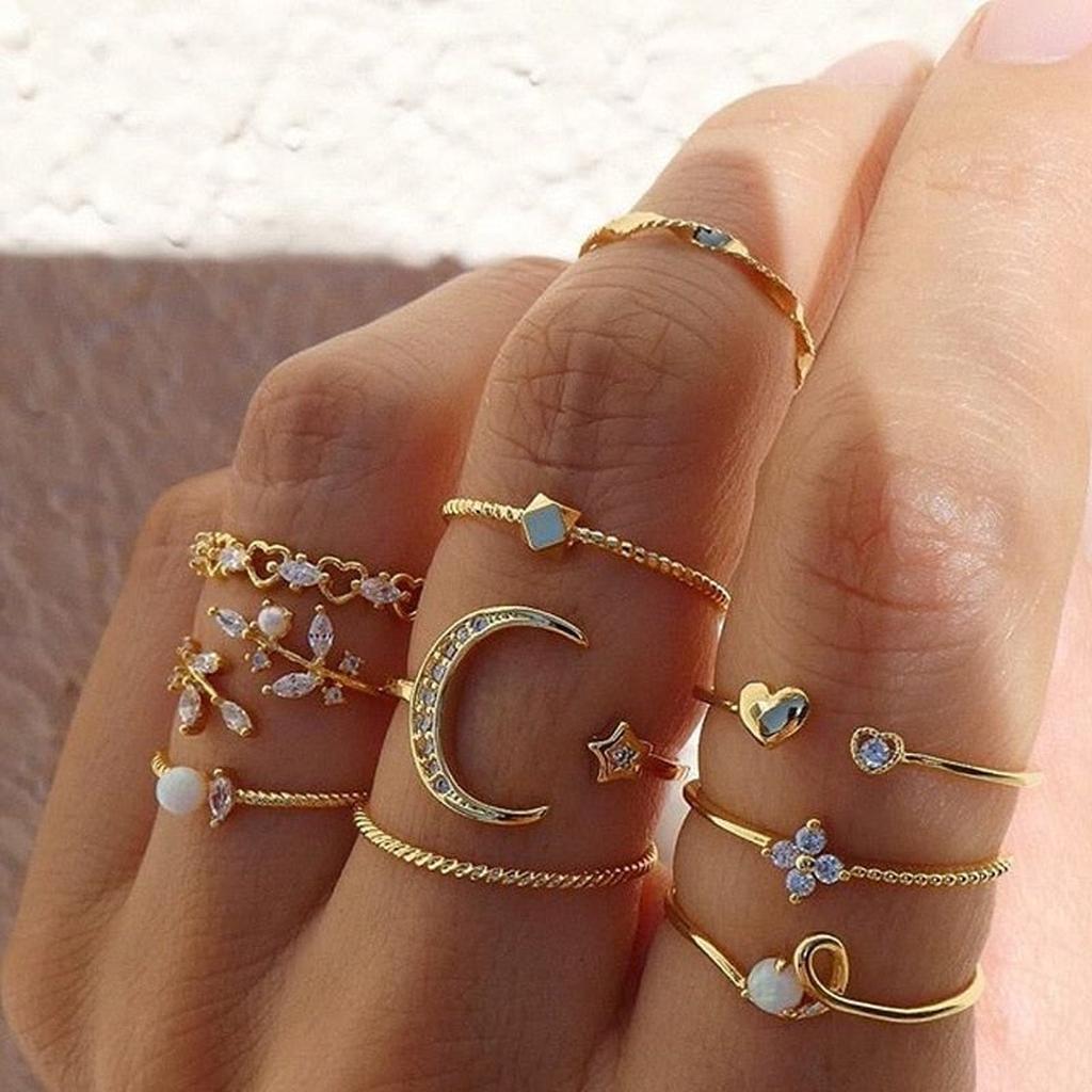 Set de 10 anillos luna y estrellas · Dorado