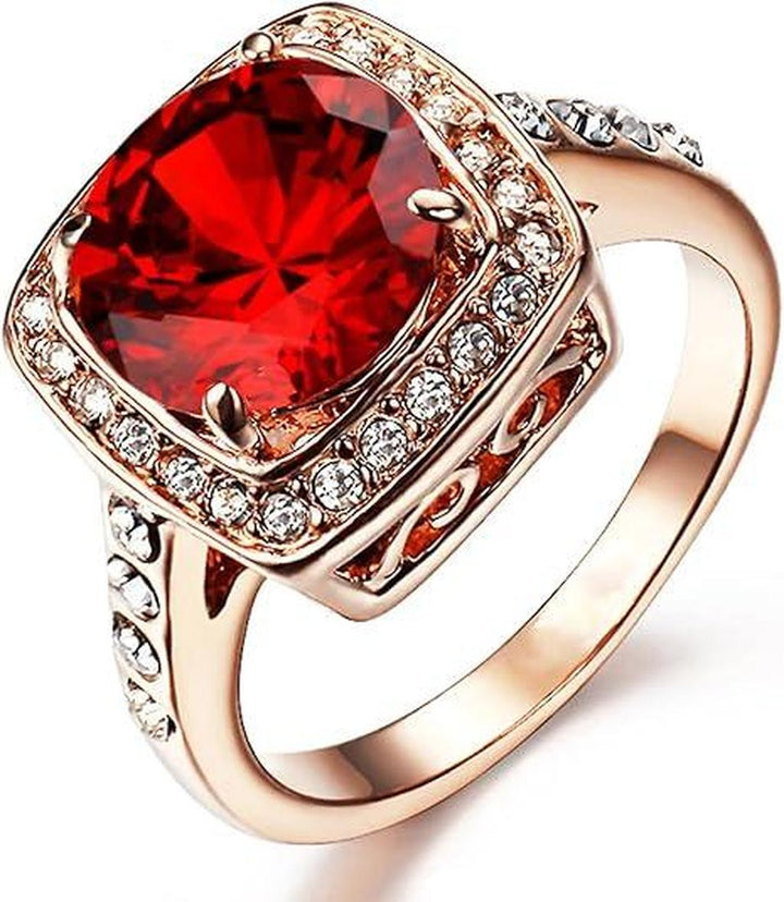 Anillo rojo rubí con corona · Rosado