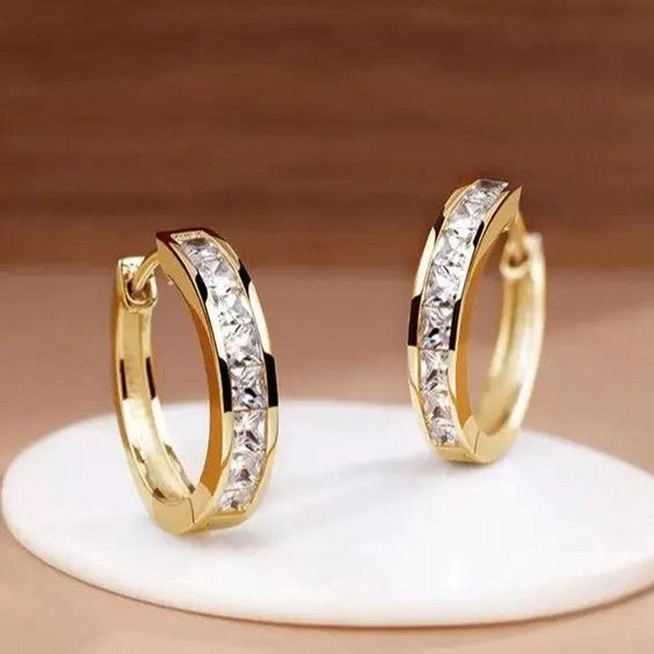Pendientes de aro con brillos cuadrados · Dorado