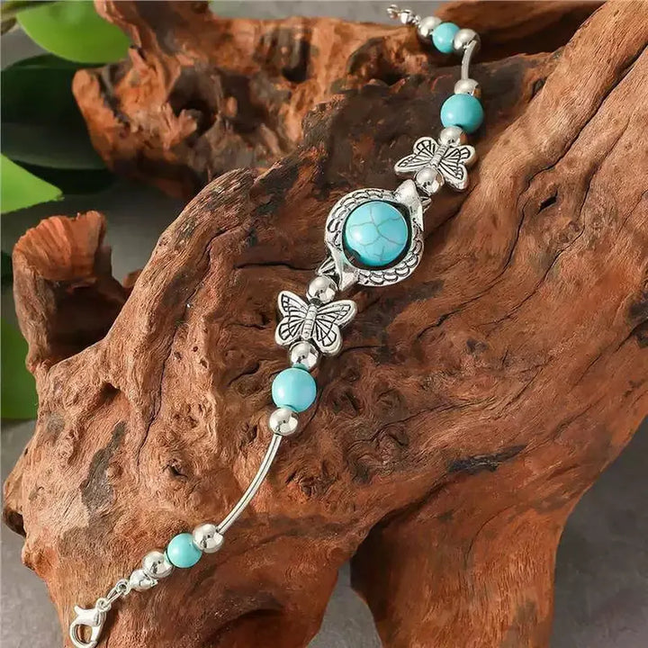Pulsera de mariposas · Plateado