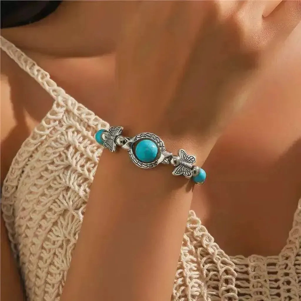 Pulsera de mariposas · Plateado