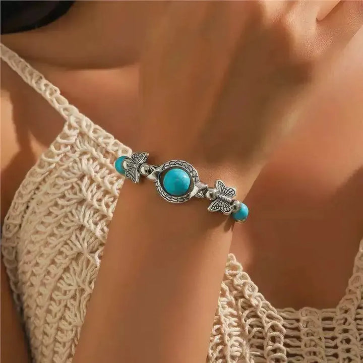 Pulsera de mariposas · Plateado