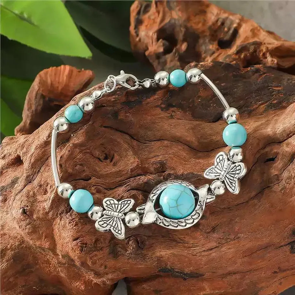 Pulsera de mariposas · Plateado