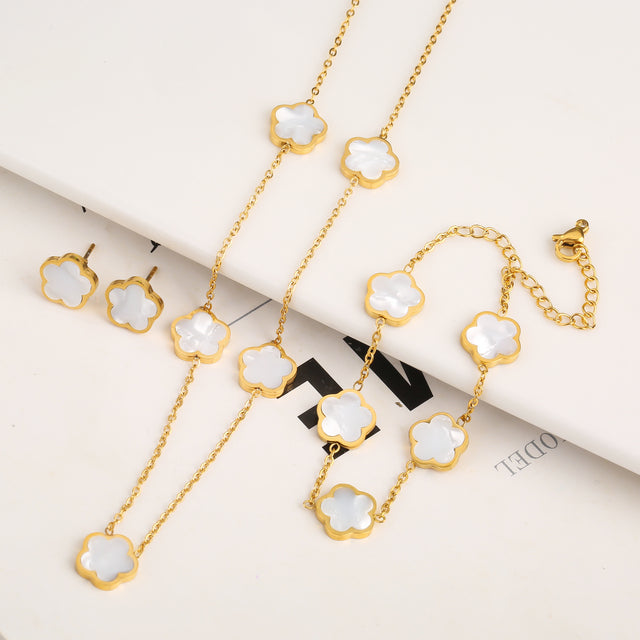 Set de pulsera, collar y pendientes de trébol · Dorado
