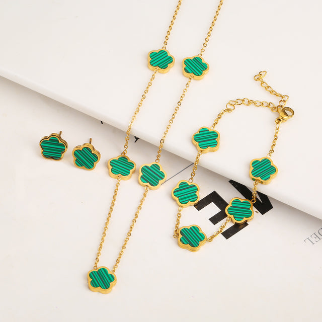 Set de pulsera, collar y pendientes de trébol · Dorado