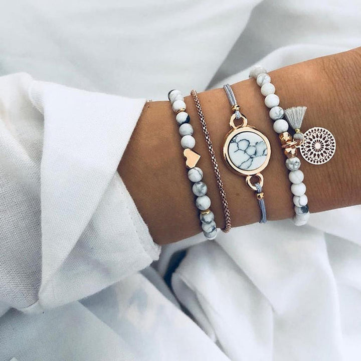 Set de pulseras boho para combinar · Dorado
