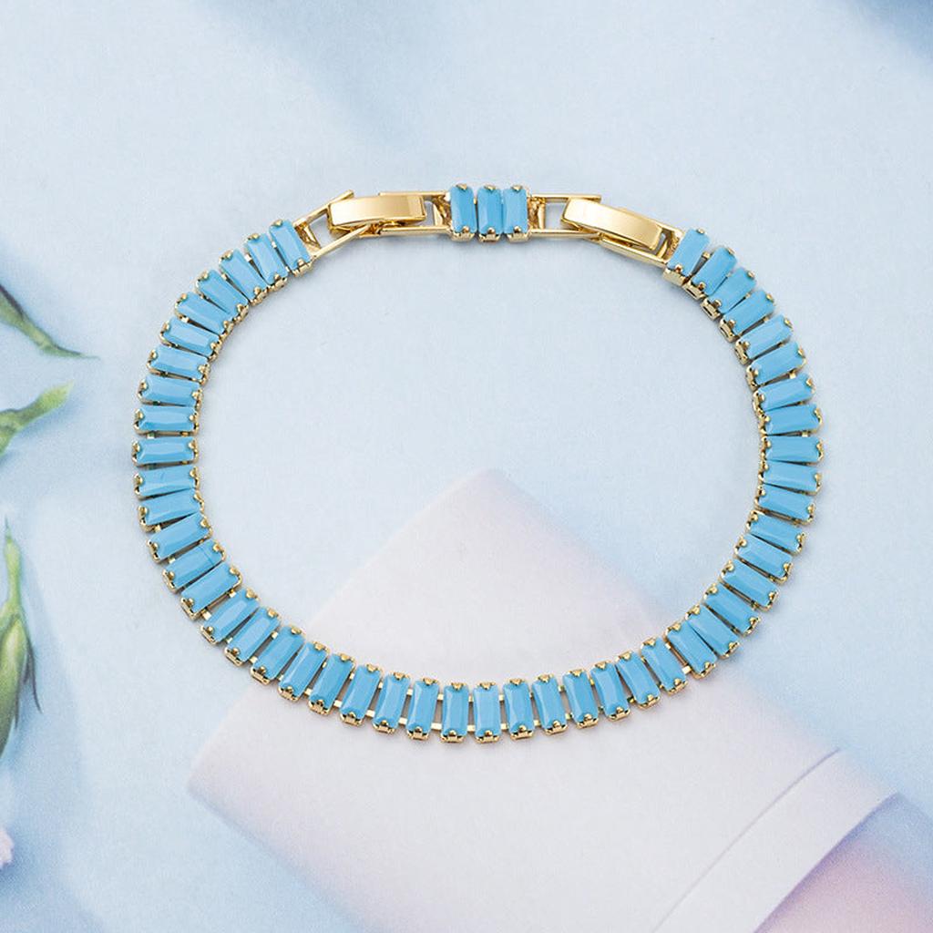 Pulsera tenis Vertéa turquesa · Dorado