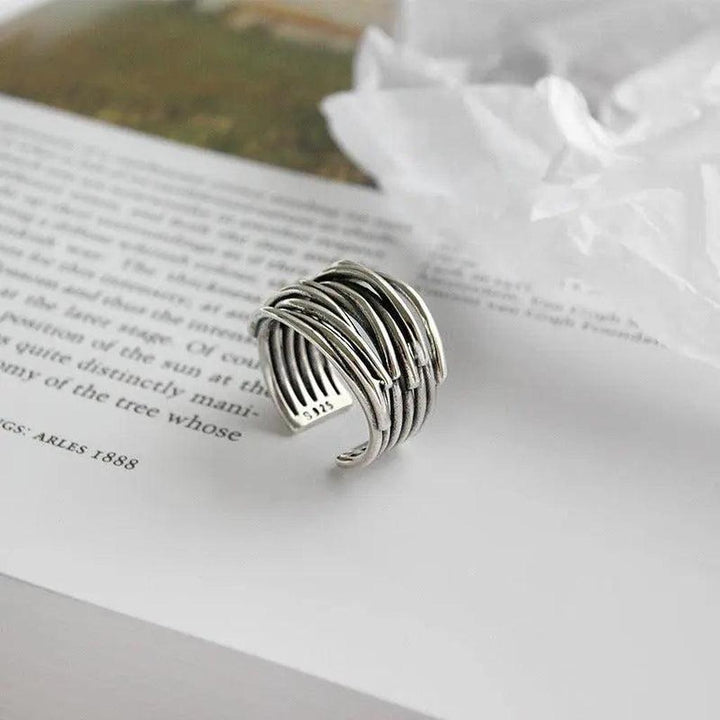Anillo ancho de varias bandas ajustable · Plateado