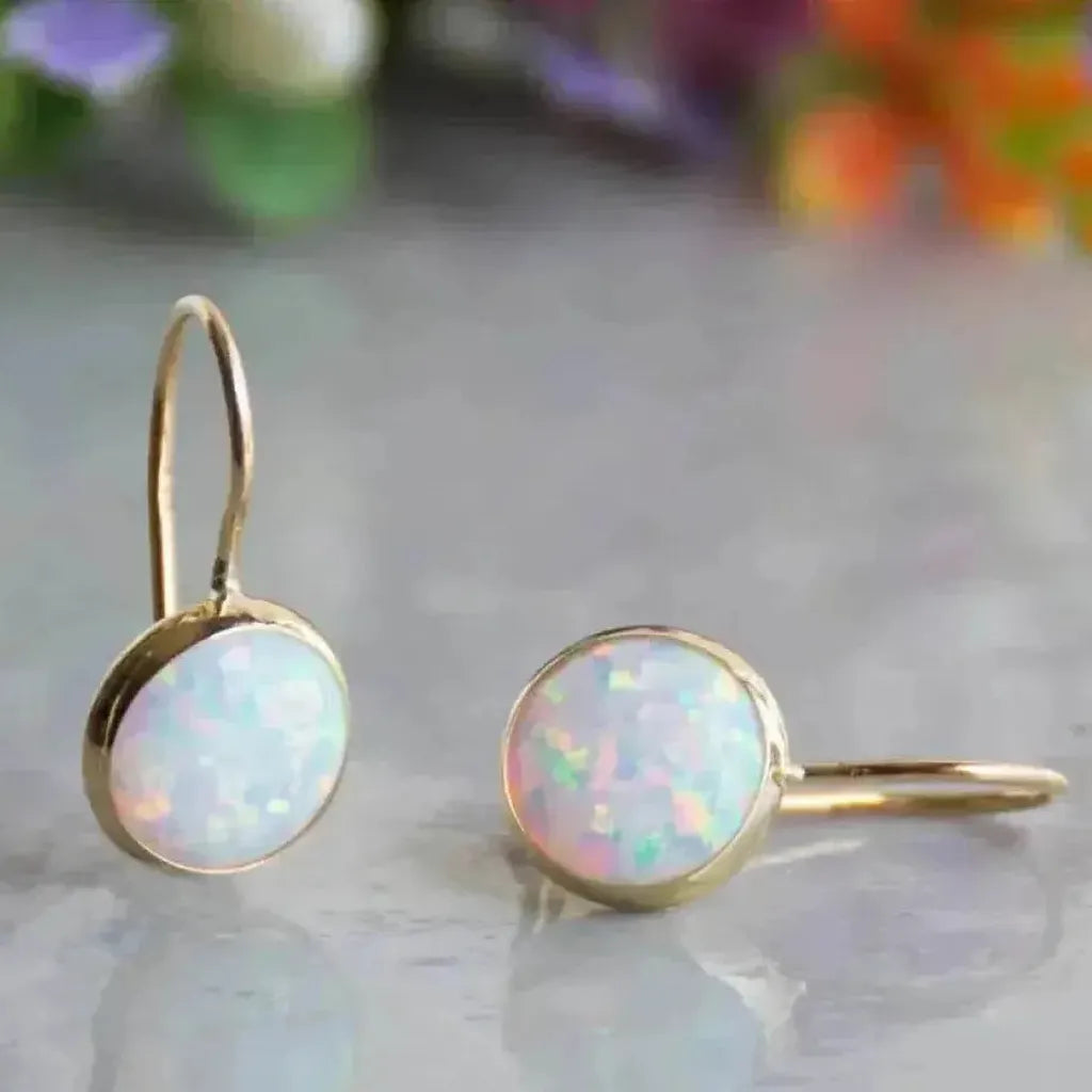 Pendientes vintage de efecto ópalo · Dorado