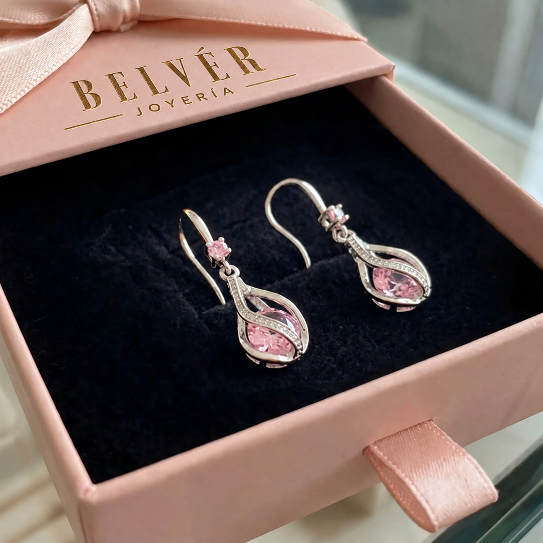 Pendientes Livia Lumen con giro · Plateado