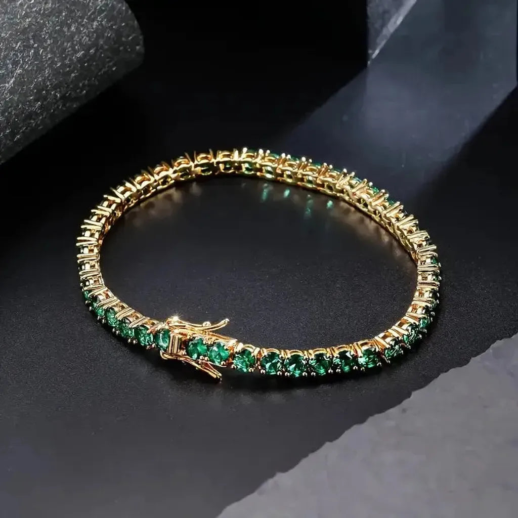 Pulsera tenis con detalles verde esmeralda · Dorado