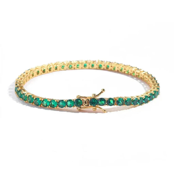 Pulsera tenis con detalles verde esmeralda · Dorado